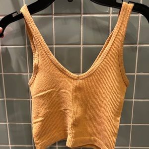 Yellow out from under ribbed tank!